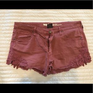 Denim shorts with lace flower trim